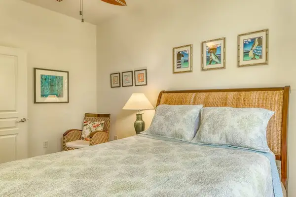 Enjoy a peaceful night’s sleep in a cozy room with a comfortable queen-size bed.