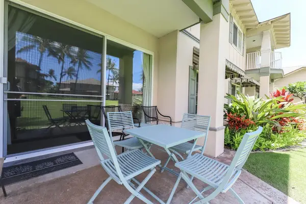 Enjoy fresh air and good company in this comfortable outdoor dining space.