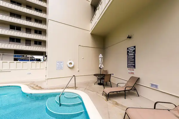 Take a leisurely dip in the inviting shared pool during your stay.