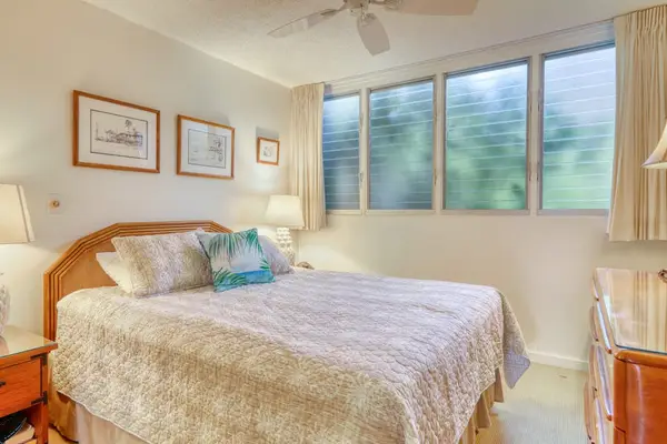 Bright Bedroom With Tropical Garden Views