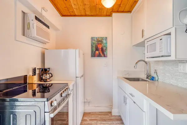 Cook, gather, and enjoy casual dining in this inviting kitchen space.