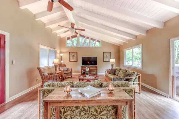 Spacious Living Room with Vaulted Ceilings