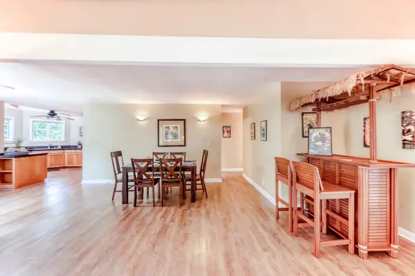 Open-Concept Dining Area with Built-in Home Bar
