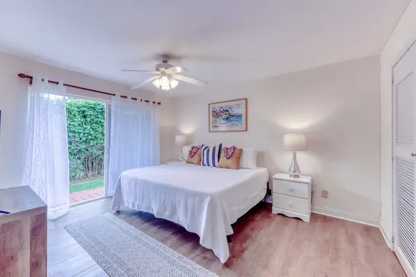 Bright Primary Bedroom with King Bed and Outdoor Views