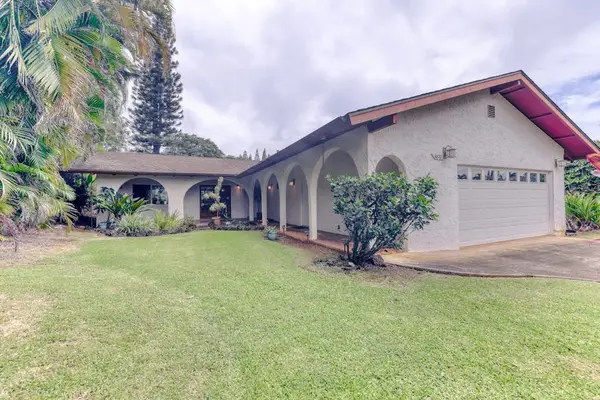 Front Exterior View with Lush Green Lawn