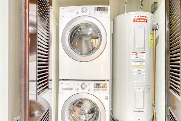 In-Unit Stacked Washer & Dryer Closet