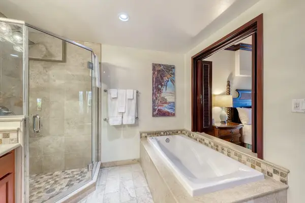 Ensuite Bathroom with Soaking Tub & Glass Walk-In Shower