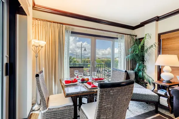 Indoor Dining Area with Seating & Balcony Access