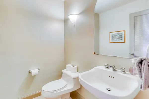 Fresh Half Bathroom With Vanity