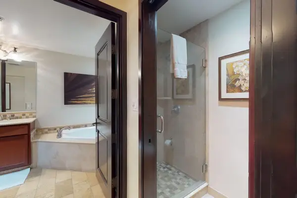 Spacious Guest Bathroom with Walk-In Shower & Soaking Tub