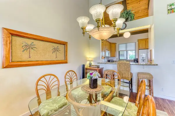 Enjoy a lovely meal under warm lighting, with plenty of seating and direct connection to the kitchen for effortless serving! 🥗🍷🏡