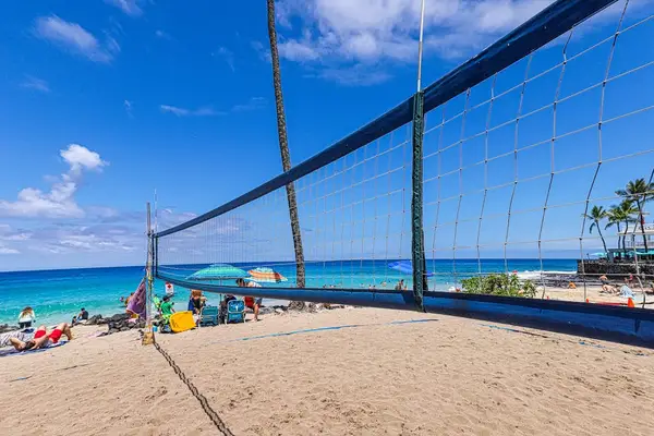 Step right onto the sand! Challenge your group to a fun game of beach volleyball on the court located just moments from the property. 🏐🏖️☀️