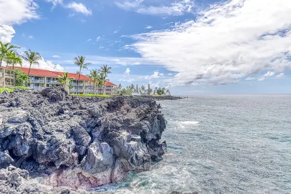 Absolutely breathtaking! Marvel at the stunning volcanic rock formations and endless ocean blue right outside. This is coastal living at its finest. 🌊🌋✨