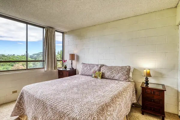 Primary bedroom with large picture window