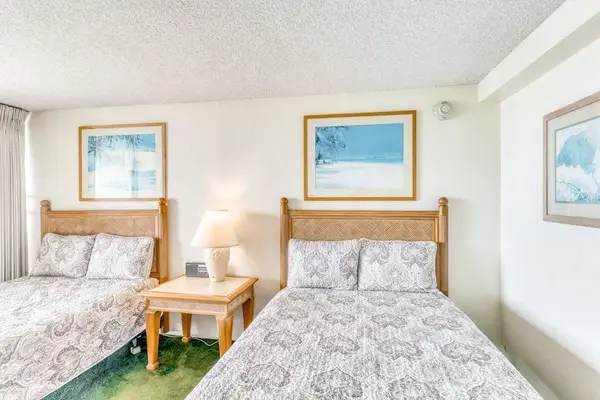 Enjoy restful nights in this comfortable studio featuring two double beds for a flexible sleeping arrangement.