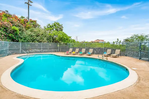 Relax by the Pool Under Sunny Skies