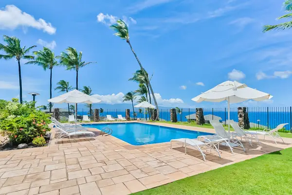 Kapalua Bay Villas Resort community pool.  Located ocean front so that you can enjoy the salt air and ocean sounds while you relax poolside.
