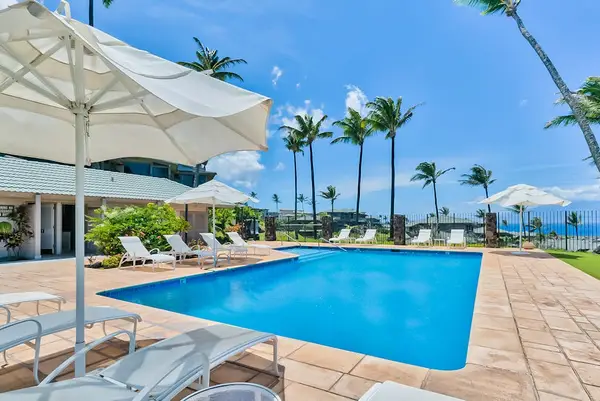 Kapalua Bay Villas Resort community pool.  Located ocean front so that you can enjoy the salt air and ocean sounds while you relax poolside.