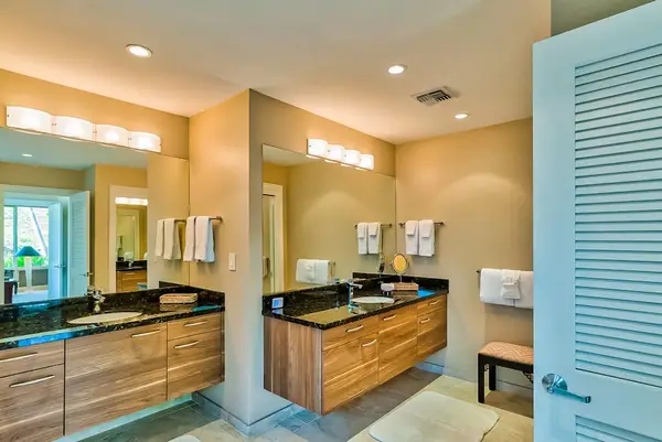 Master bathroom with newly remodeled large walk-shower and double sinks.