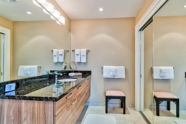 Master bathroom with newly remodeled large walk-shower and double sinks.