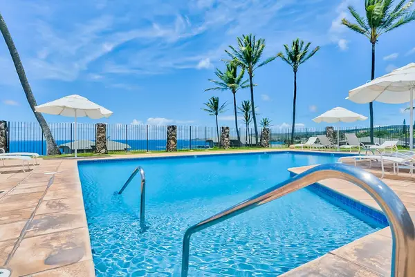 Kapalua Bay Villas Resort community pool.  Located ocean front so that you can enjoy the salt air and ocean sounds while you relax poolside.