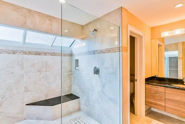 Master bathroom with newly remodeled large walk-shower.