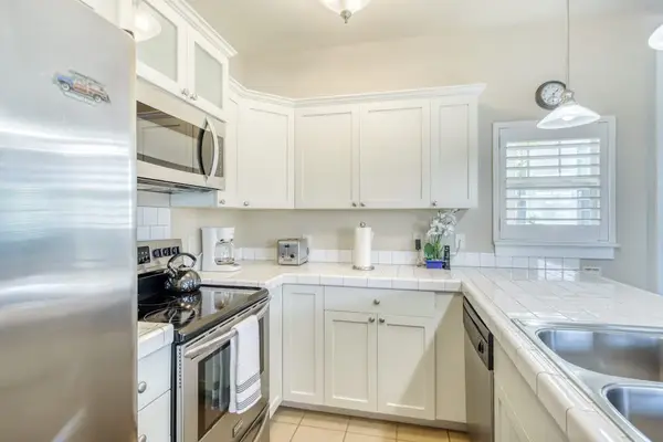 Sleek Stainless Steel Appliances & Ample Counter Space for Cooking