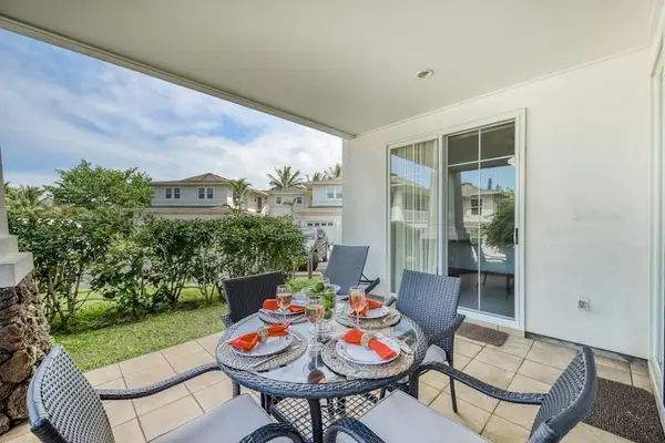 Private Covered Lanai with Outdoor Dining & Tropical Garden Views