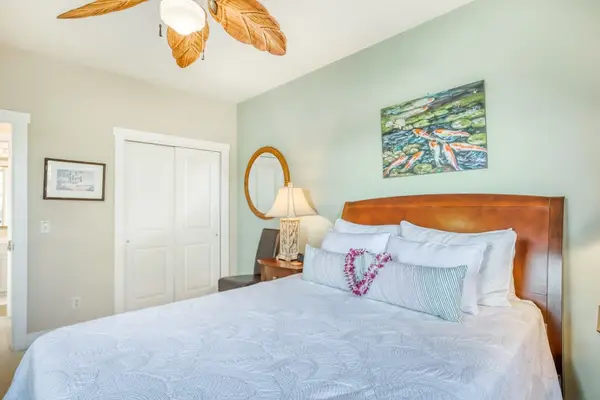 Bright & Peaceful Bedroom with Ceiling Fan & Ample Closet Space