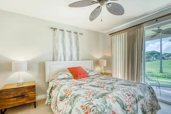 Inviting Primary Bedroom With Garden Views