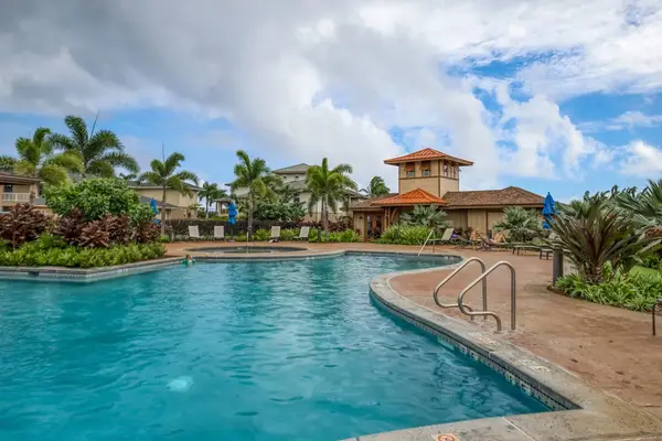 Sparkling Resort Pool Under Blue Skies
