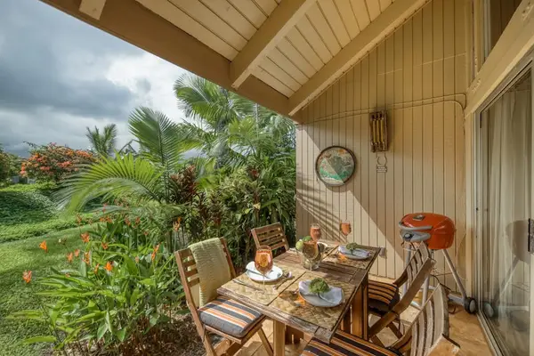 Enjoy meals on the covered lanai surrounded by tropical gardens