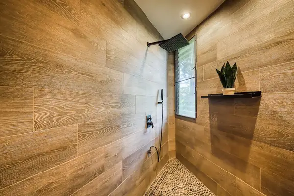 Modern walk-in shower with elegant finishes