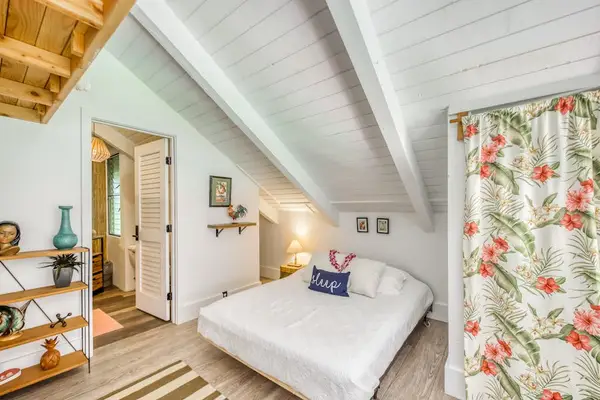 Charming loft bedroom with vaulted ceiling