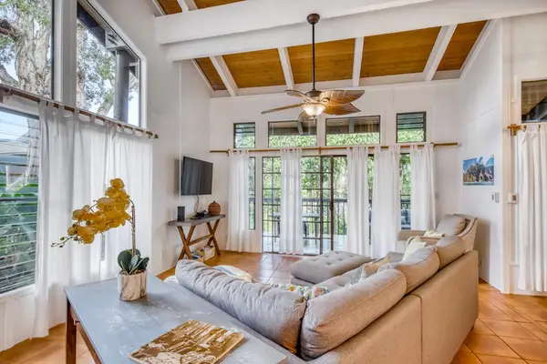 Living Area with Vaulted Ceiling & Covered Lanai Access