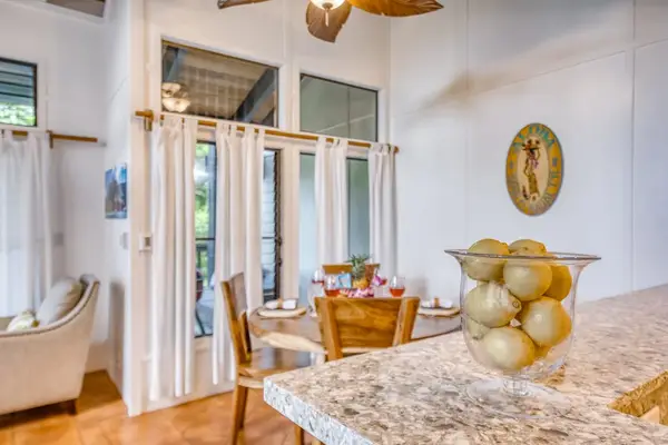 Seamless Flow from Kitchen Breakfast Bar to Dining Area