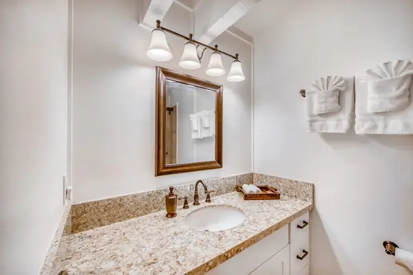 Elegant Bathroom Vanity with Granite Top & Frame Mirror