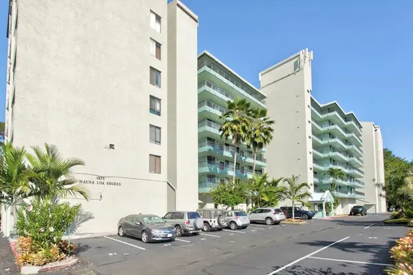Welcoming Condo Exterior With Palm Trees