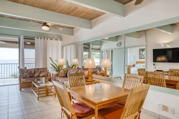 Dining area with seating for the whole group and ocean views.