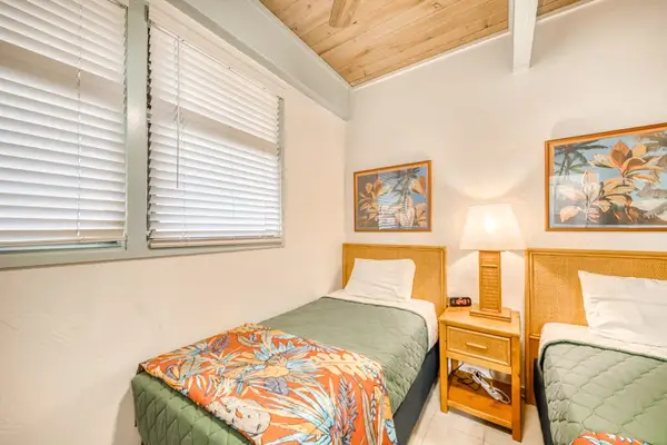 Guest bedroom with a comfortable bed and a bright, airy feel.