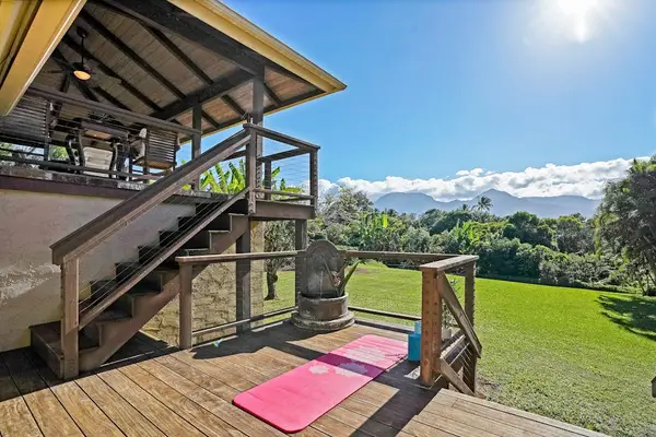 Wake up and enjoy yoga in the fresh Hawaiian air.