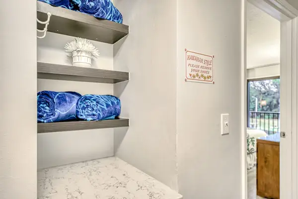 Thoughtful Bathroom Storage With Fresh Linens