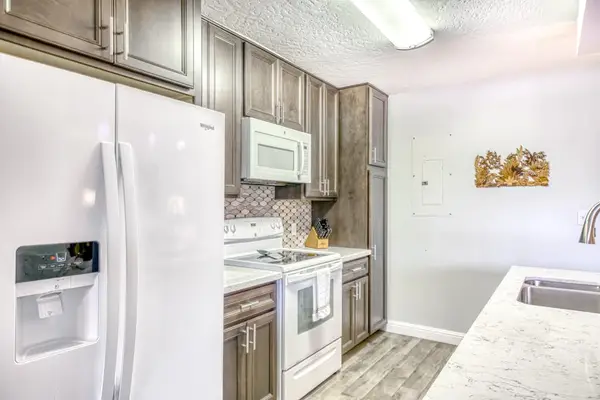Modern Kitchen With Warm Wood Cabinetry