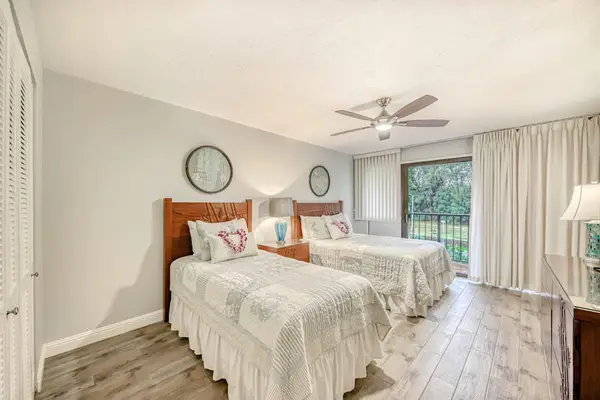 Bright Bedroom With Two Cozy Beds