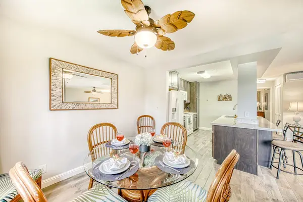 Charming Dining Area With Tropical-Inspired Decor