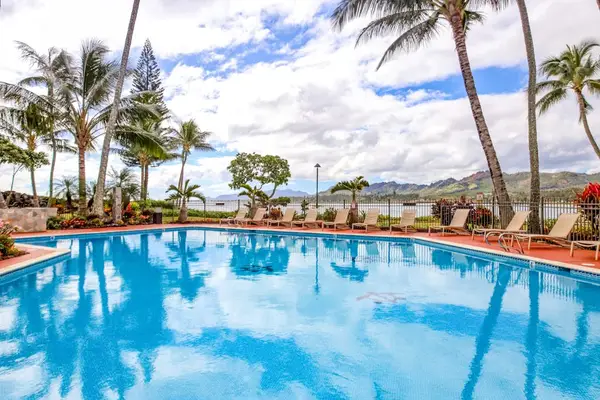 Sparkling Pool Under Blue Skies