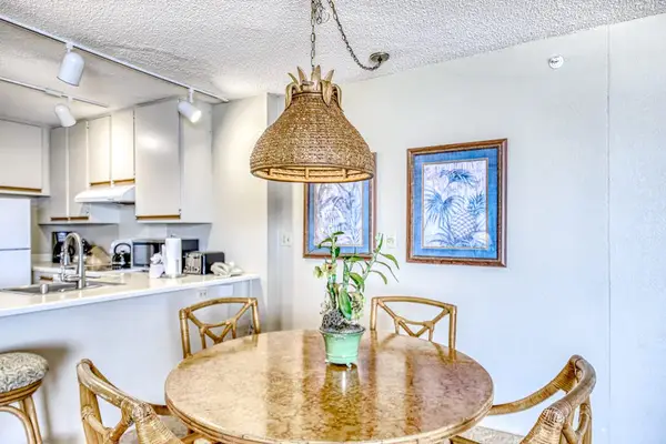 Sunny Dining Space For Island Gatherings