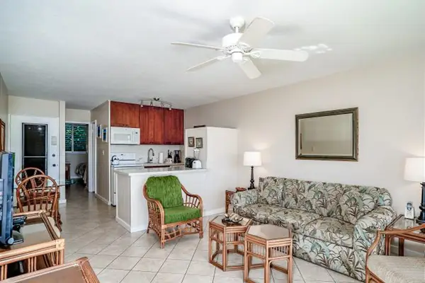Open concept living allowing for lots of natural light from the lanai and for you stay engaged with your guests from living room to kitchen.
