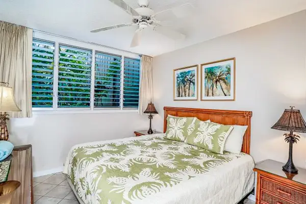 King sized bed with ceiling fan for even comfort.