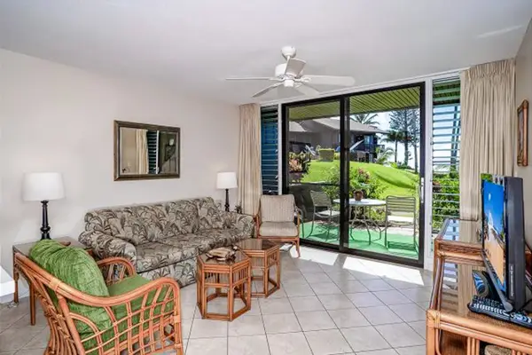 Lovely views of your tropical paradise from the glass doors to your private lanai.